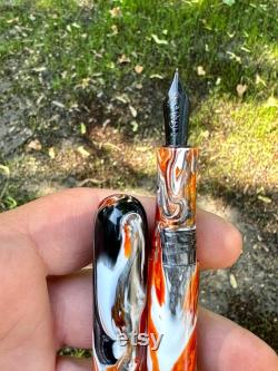 14mm Bumpy Savannah with a Square thread cap and body. Turnt Pen Co Hallows Eve material. 6 Bock nib.