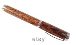 Engraved wood fountain pen.