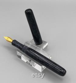 Handcrafted bespoke Fountain Pen with a body of black resin with sparkle that is like the midnight sky and is a one of a kind.