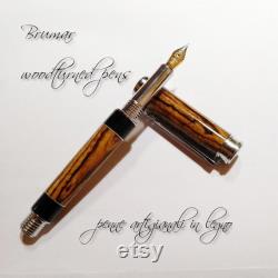 Handcrafted fountain pen in bocote and ebony wood.